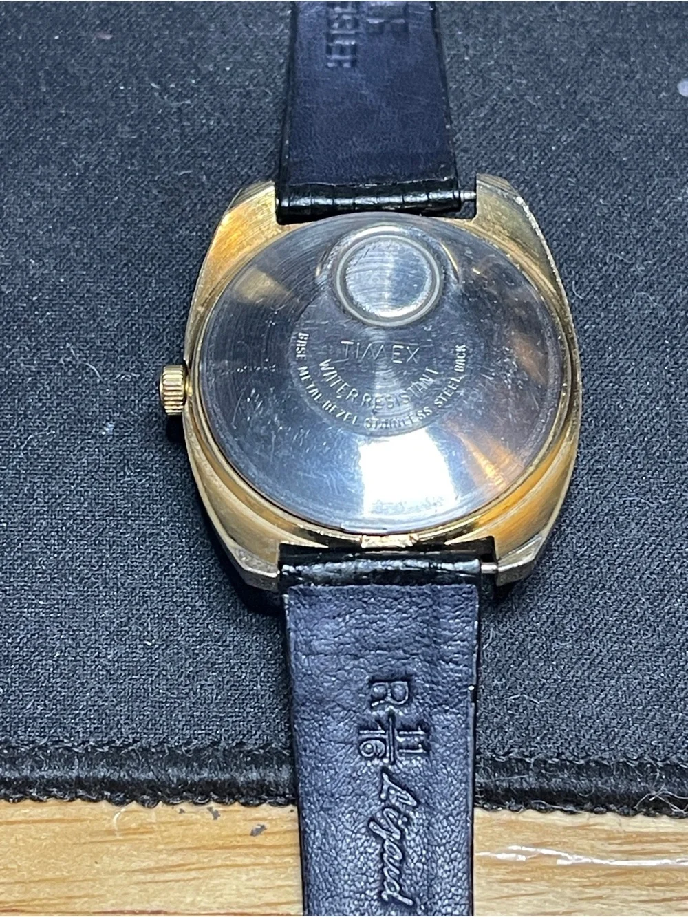 Timex Gold Tone Watch with Black Strap and White Dial